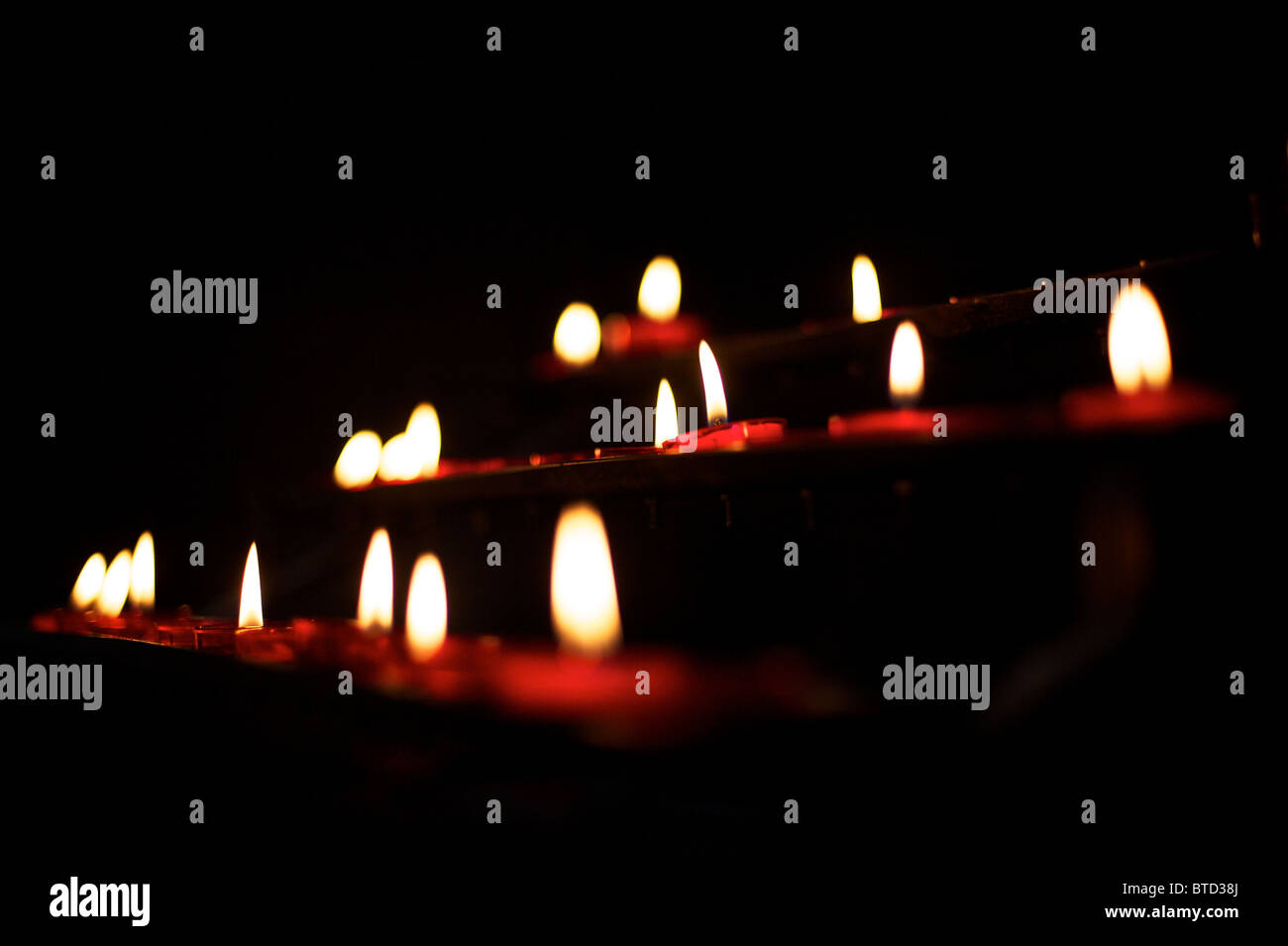 lit prayer candles Stock Photo Alamy