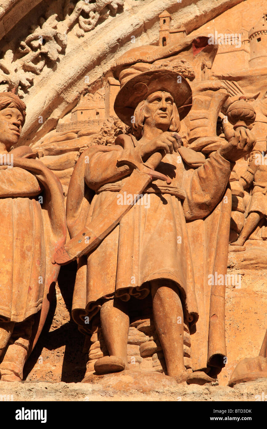 Seville Cathedral portal decoration showing Christopher Columbus offering spices to Isabella I of Castile in Seville, Spain Stock Photo