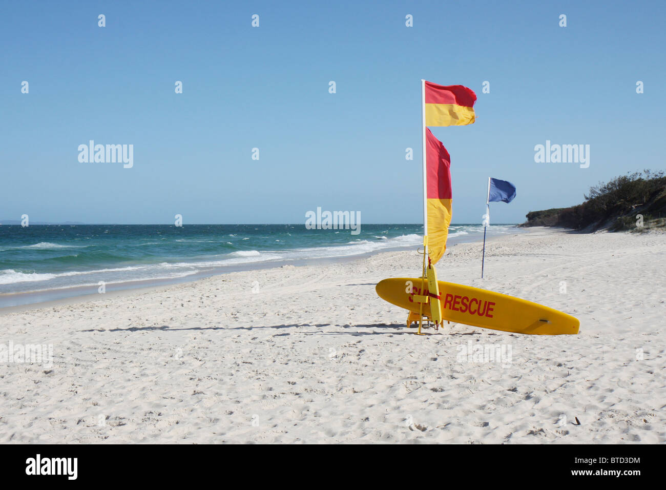 Australian Beach Surf Rescue and Flag on a sunny beach Stock Photo