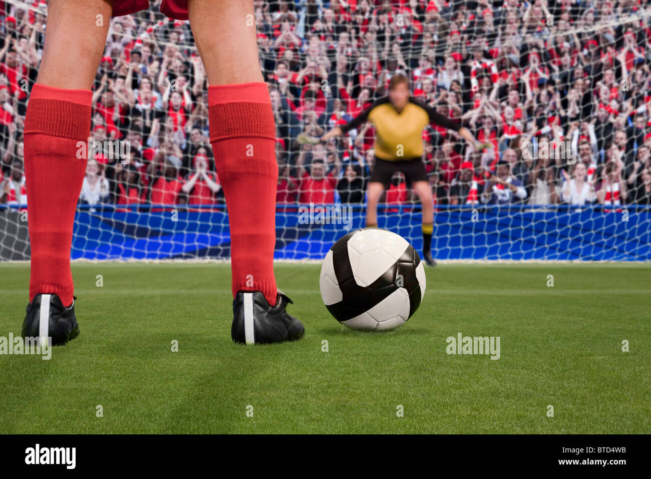 Goalkeeper anticipating free kick Stock Photo Alamy