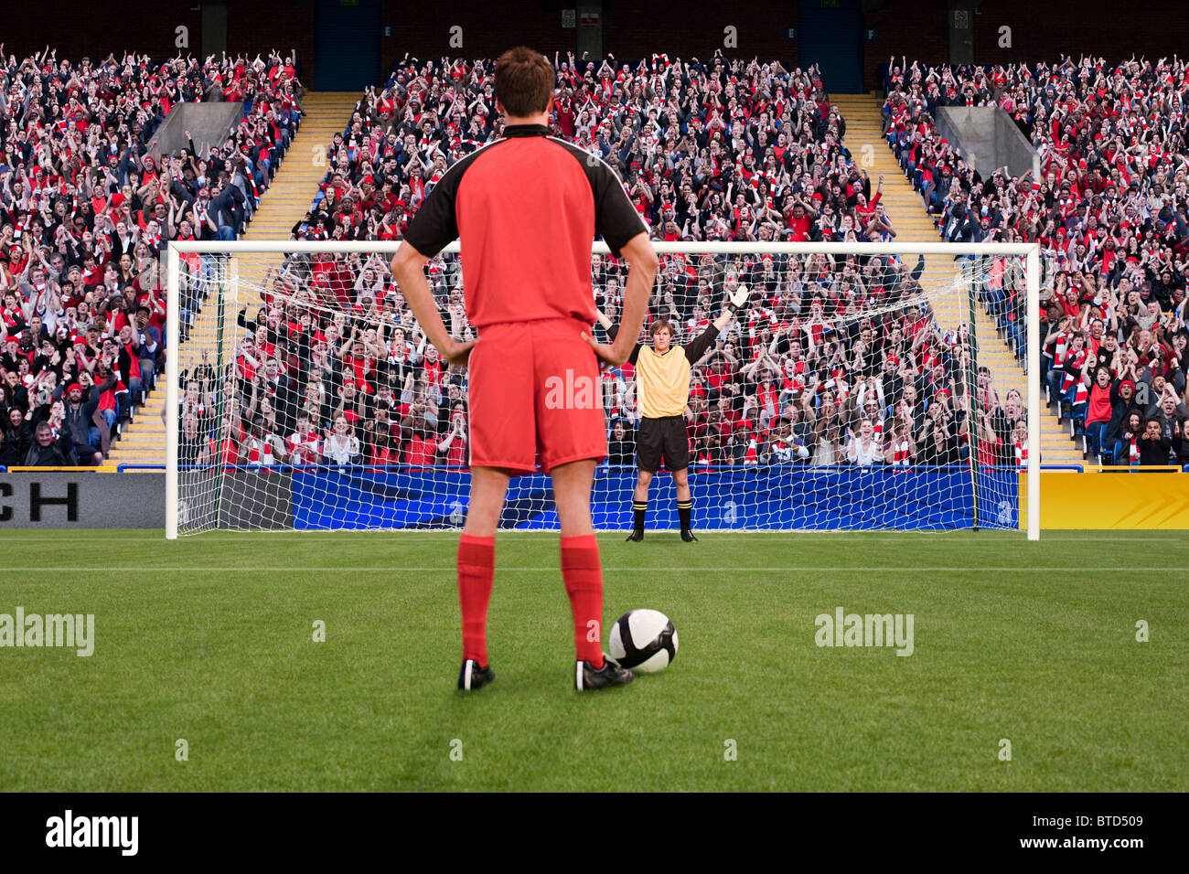 Goalkeeper anticipating free kick Stock Photo Alamy