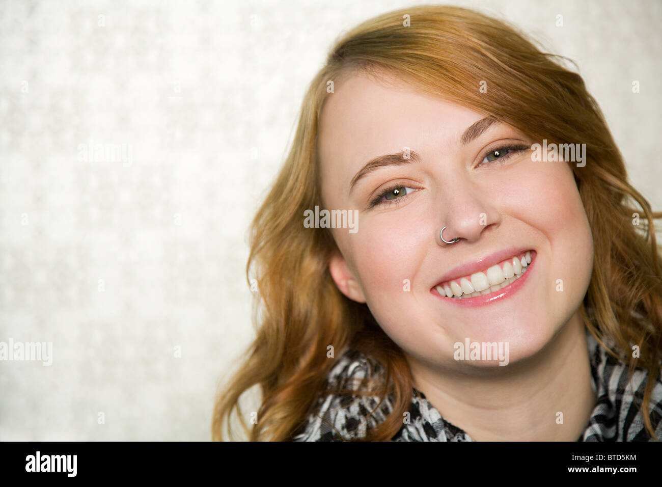 Portrait of teenage girl smiling Stock Photo