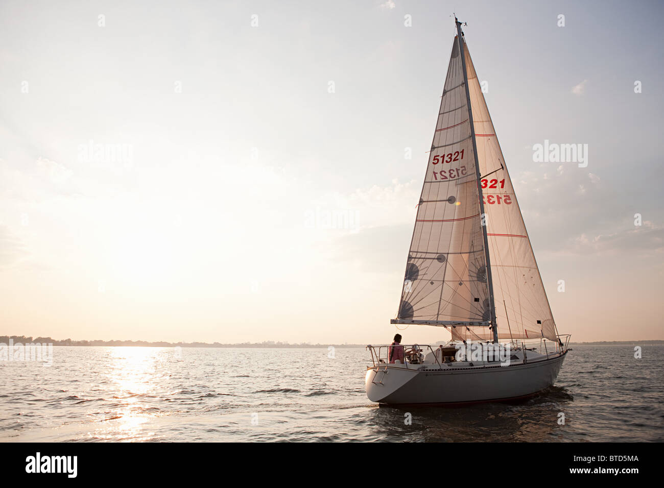 Yacht sailing on sea Stock Photo