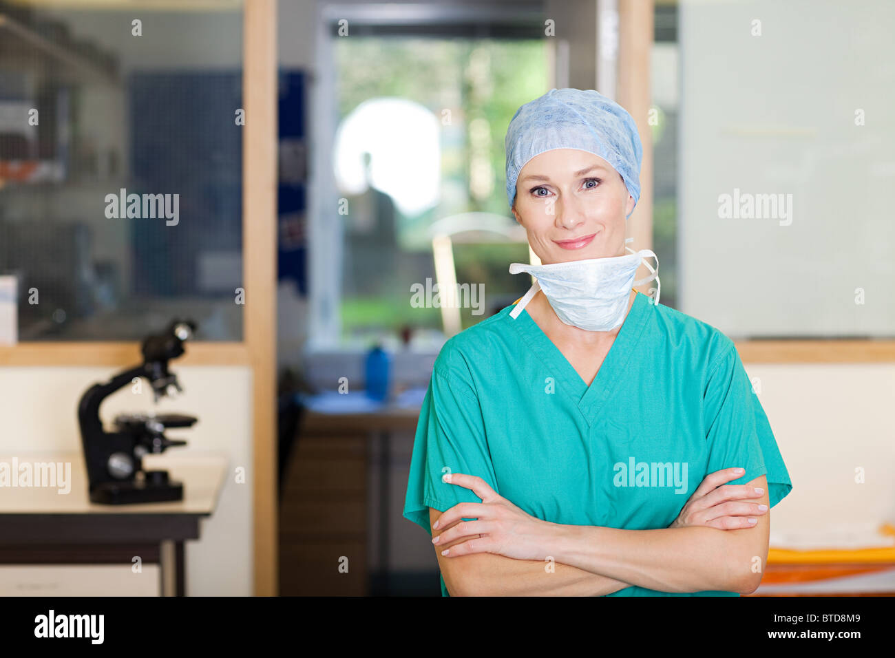 Female surgeon in scrubs Stock Photo