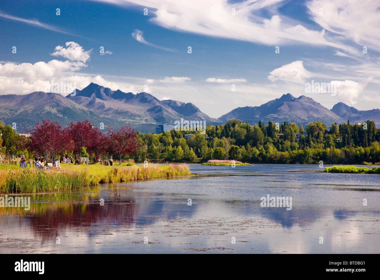 View over Westchester Lagoon and the Chugach Mountains during Summer, Anchorage, Southcentral Alaska Stock Photo