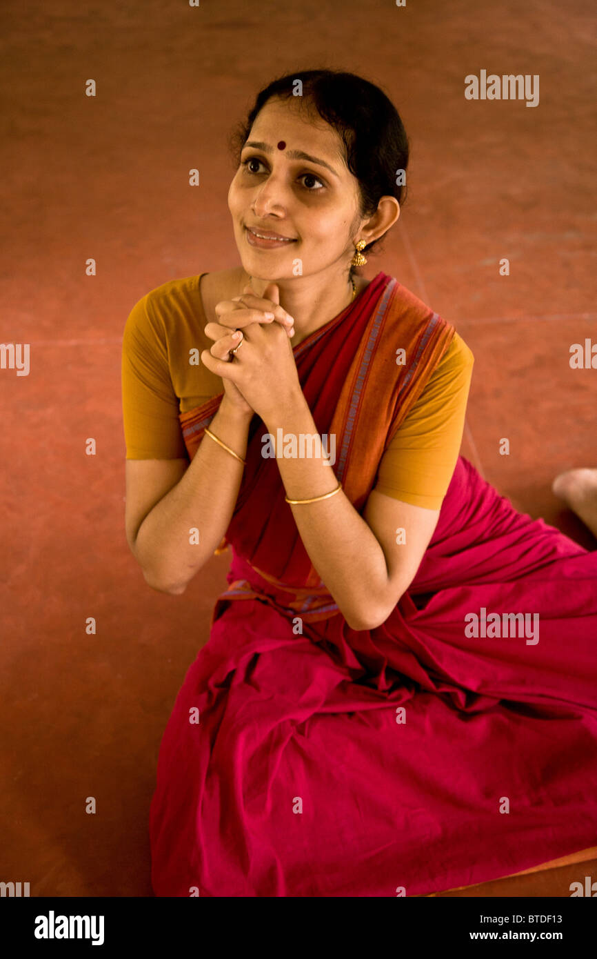 Ganga Thampi, teaches young dancers movement, rhythm and expression, known as 'nritya' and seen here a lesson in 'abhinaya', or Stock Photo