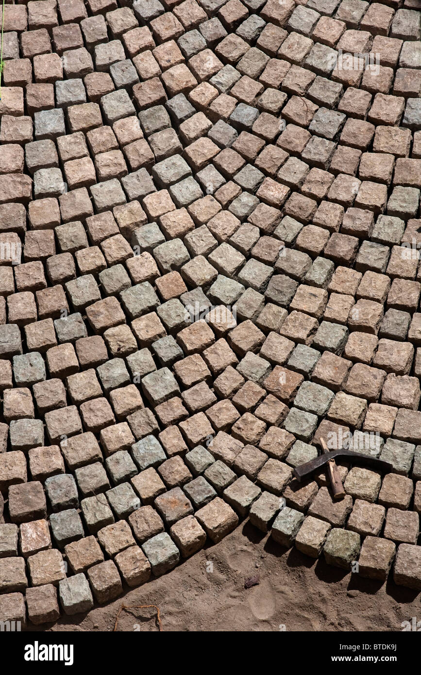 Cobble stones laid out to make a stone pavement in Ethiopia Stock Photo