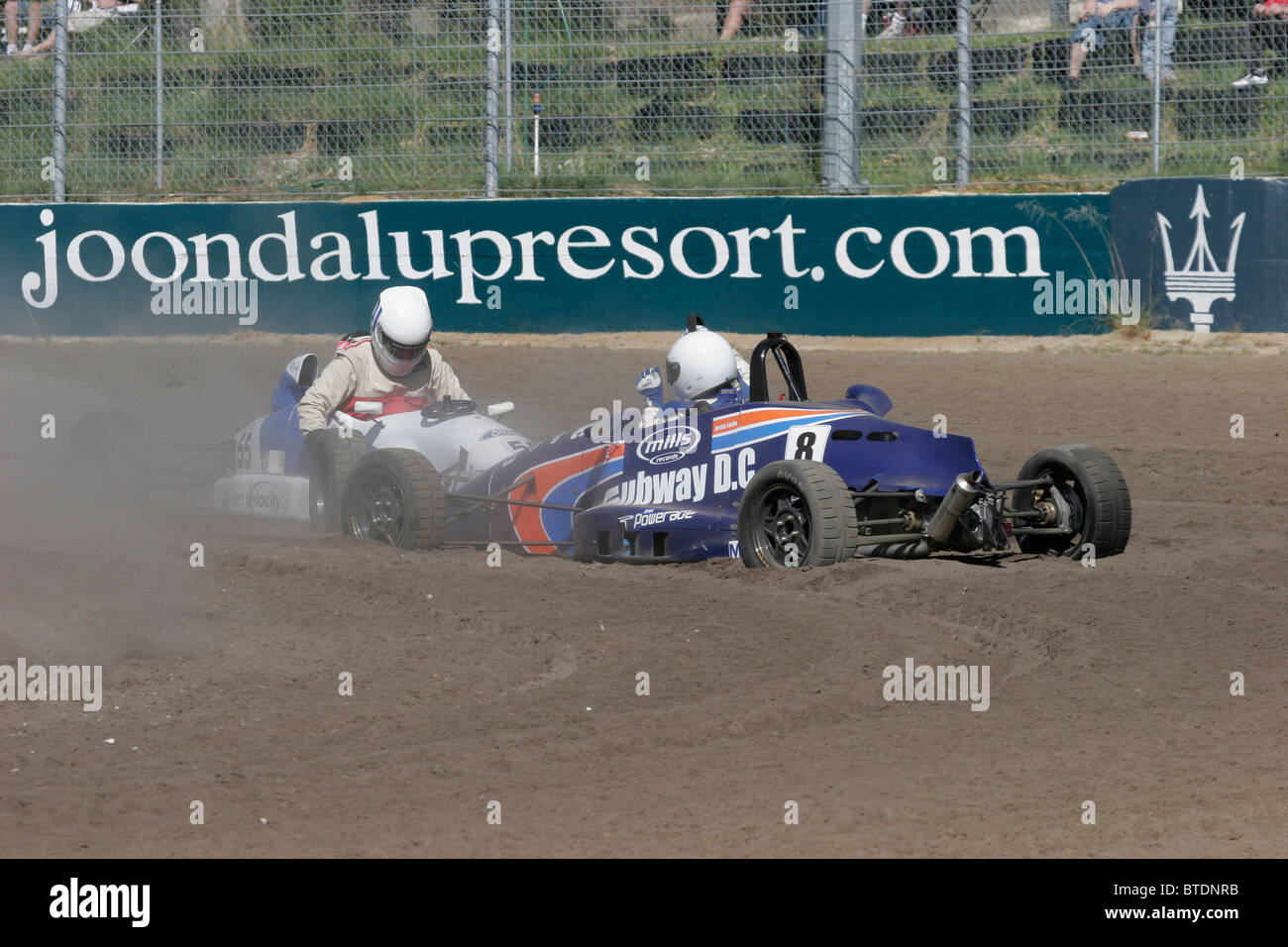 Two race cars crashed out at an Australian race track Stock Photo - Alamy