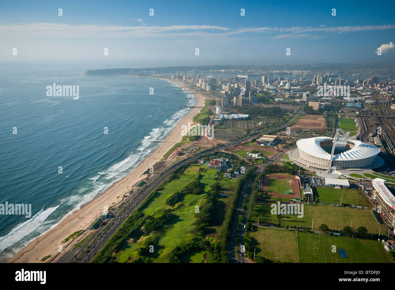 An aerial view of the Moses Mabhida soccer stadium in Durban and the coastline Stock Photo