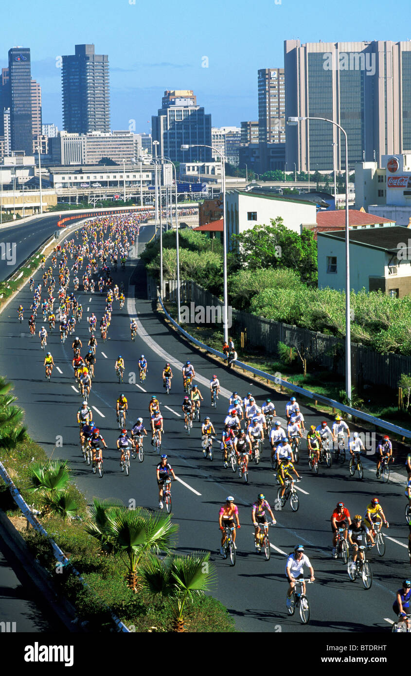 Cyclists competing in the annual Cape Argus cycle race held in Cape Town Stock Photo