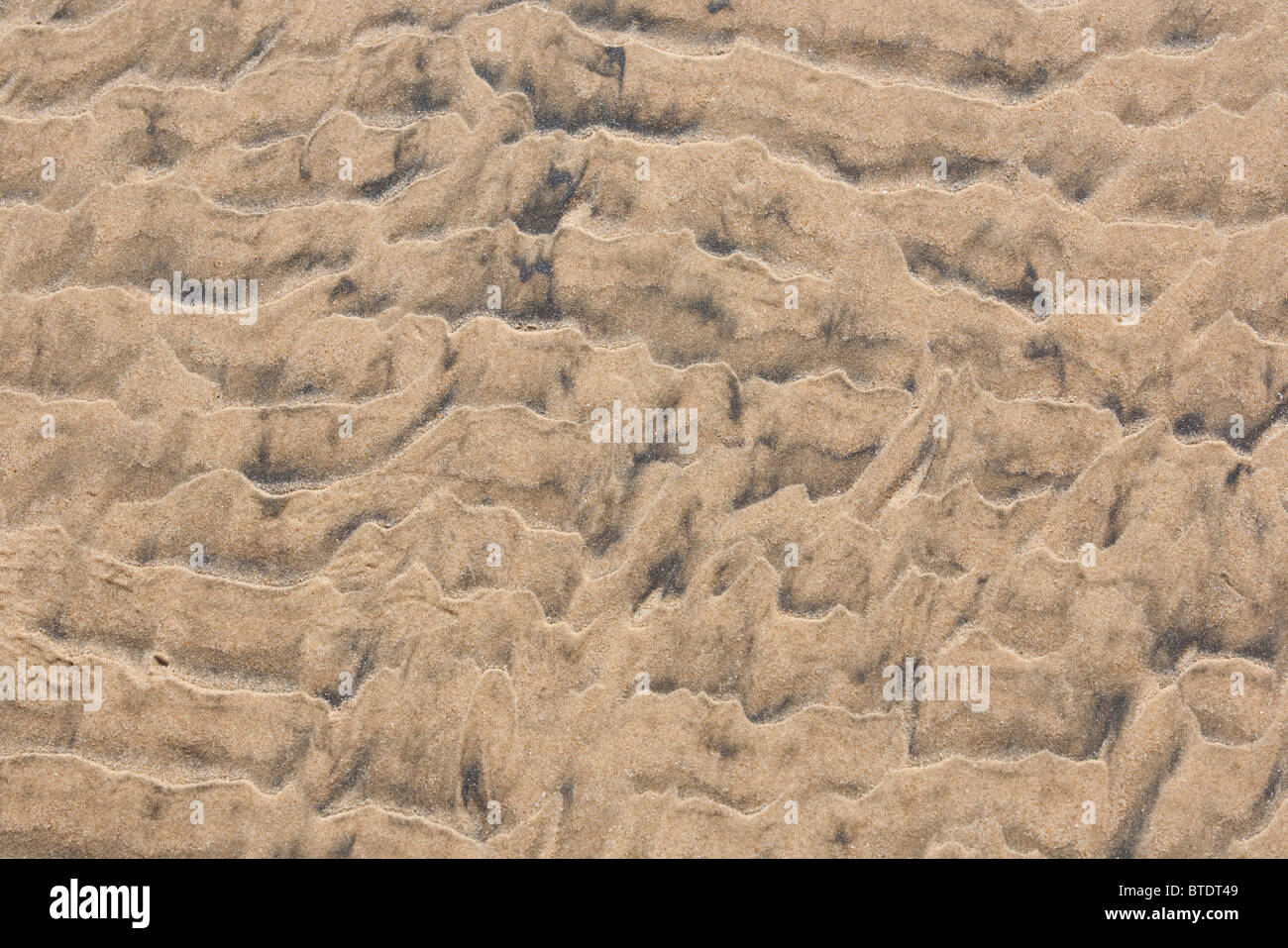 Patterns in beach sand Stock Photo