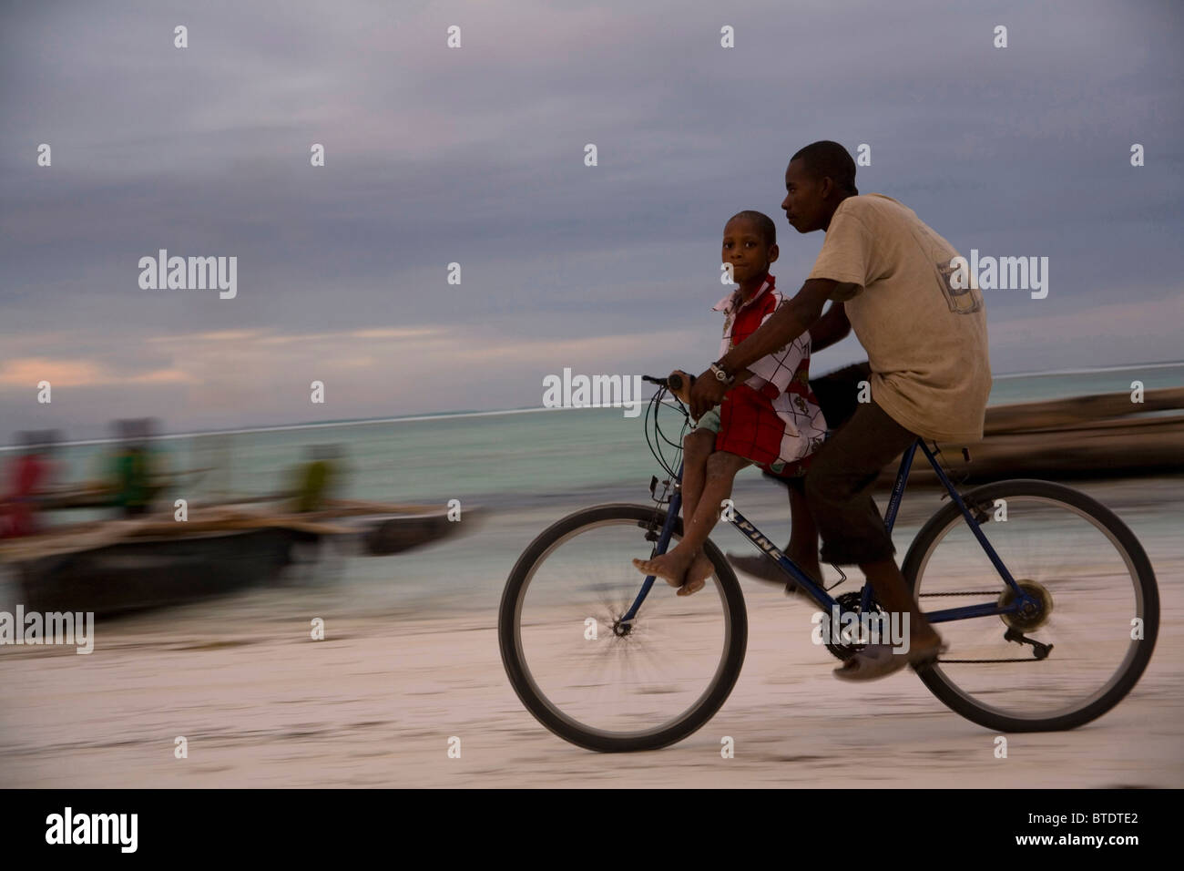 Riding on the handlebars of a bike hotsell