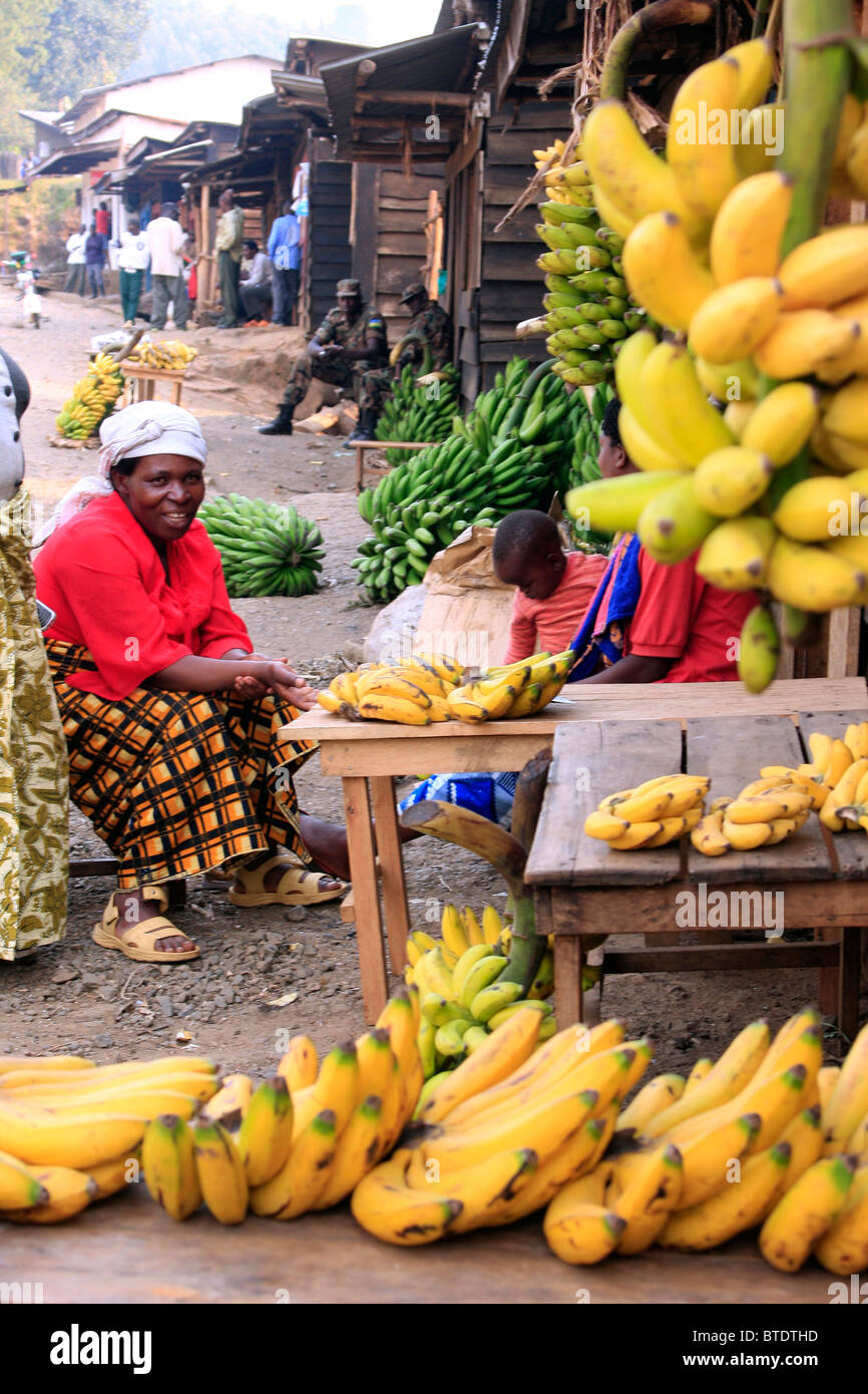 Woman selling bananas at the market in Gisankura Village Stock Photo