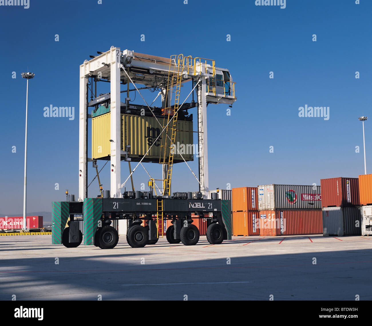 Containers are grouped and packed using this Stock Photo