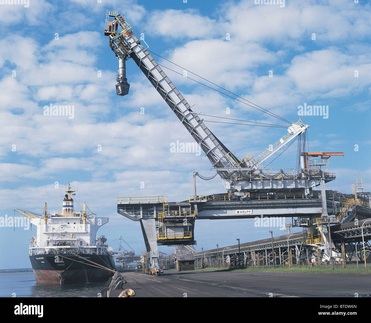 The large crane is used to load and unload containers from ships Stock ...