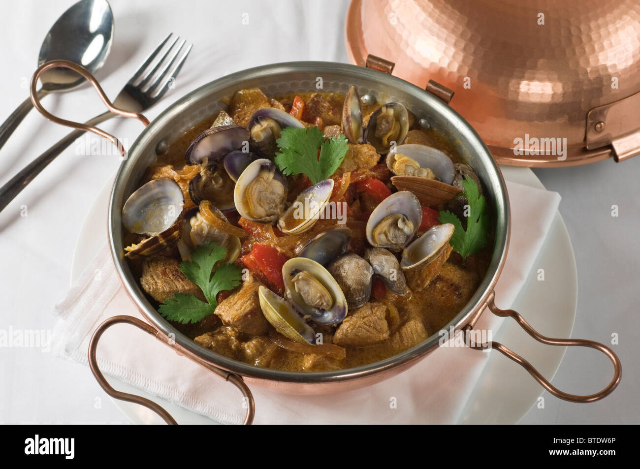 Pork with clams Alentejo style Portugal food Stock Photo