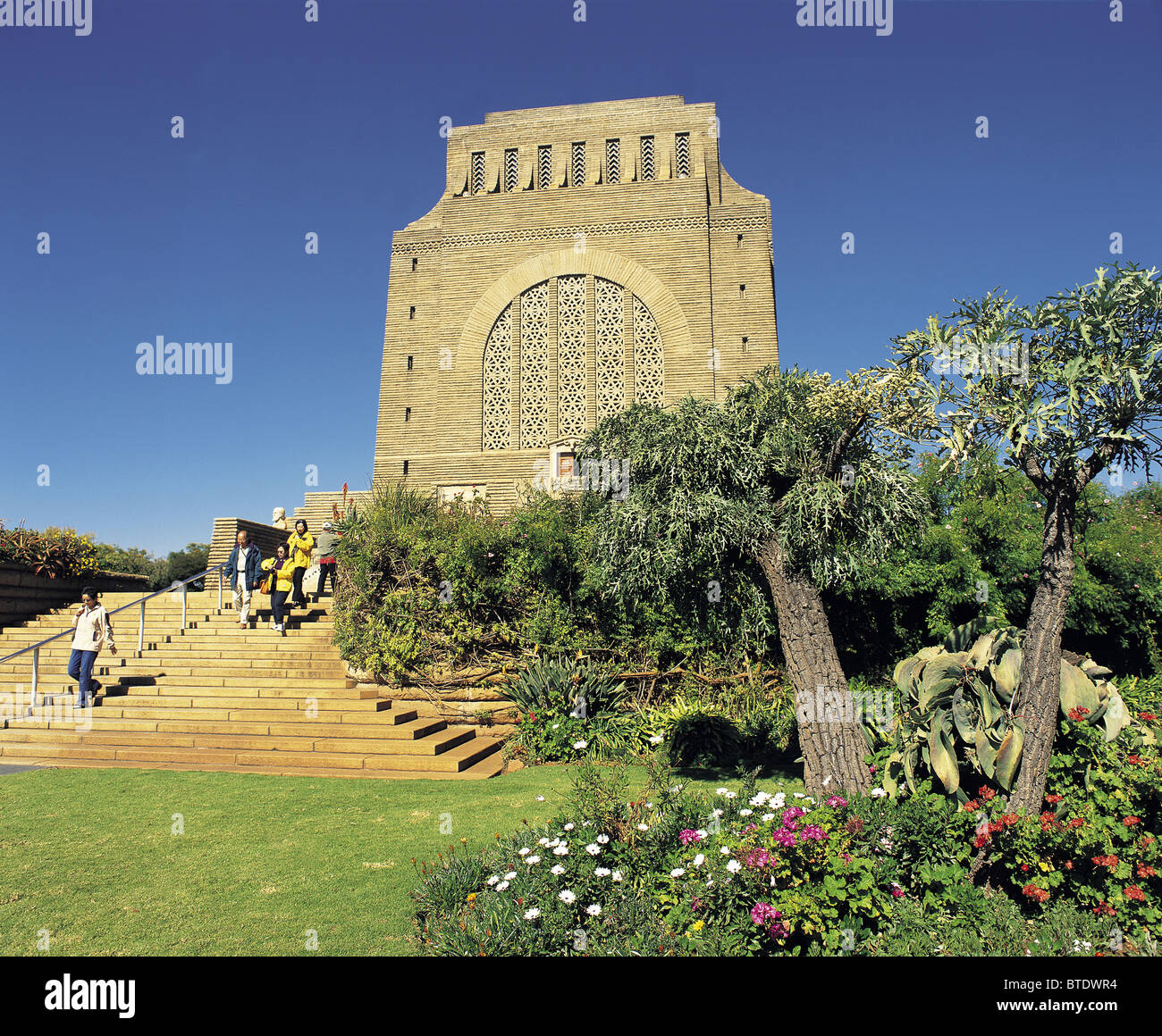 A view of the Voortrekker Monument, showing tourists walking down the steps Stock Photo