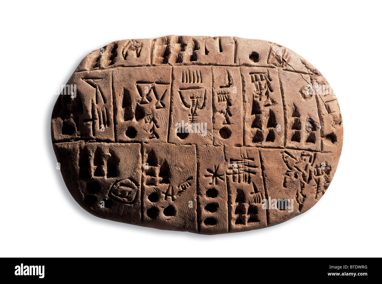 Clay tablet inscribed with an Archaic Pictographic script. Originating in Mesopotamia in the late fourth millenium BC this is th Stock Photo