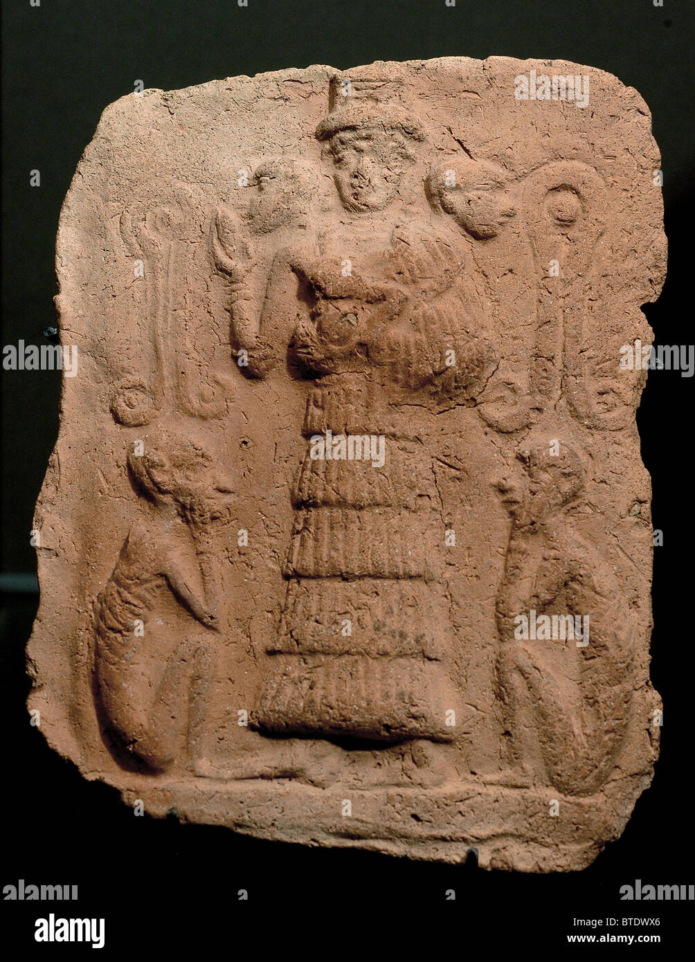 5338. Goddess with apes, Mesopotamia, Eshnunna Stock Photo