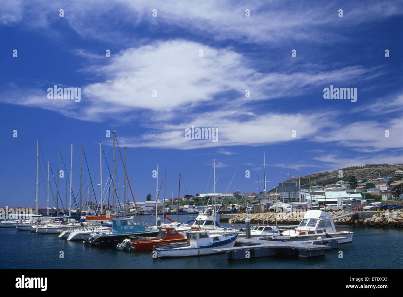 Yachts and boats moored in the small craft harbour at Mossel Bay Stock Photo