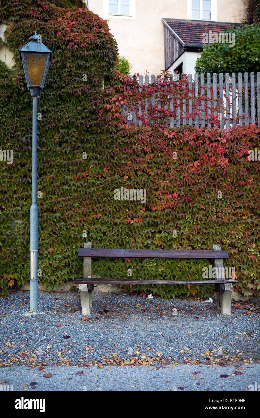old wooden bench with lamp post, Durnstien Stock Photo - Alamy