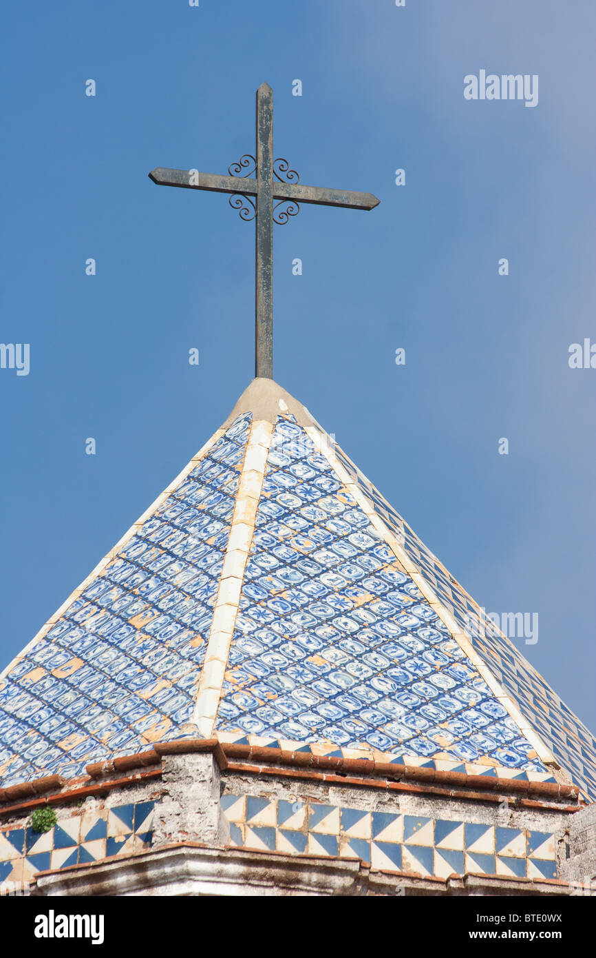 Cross on top of a church steeple, Spain Stock Photo