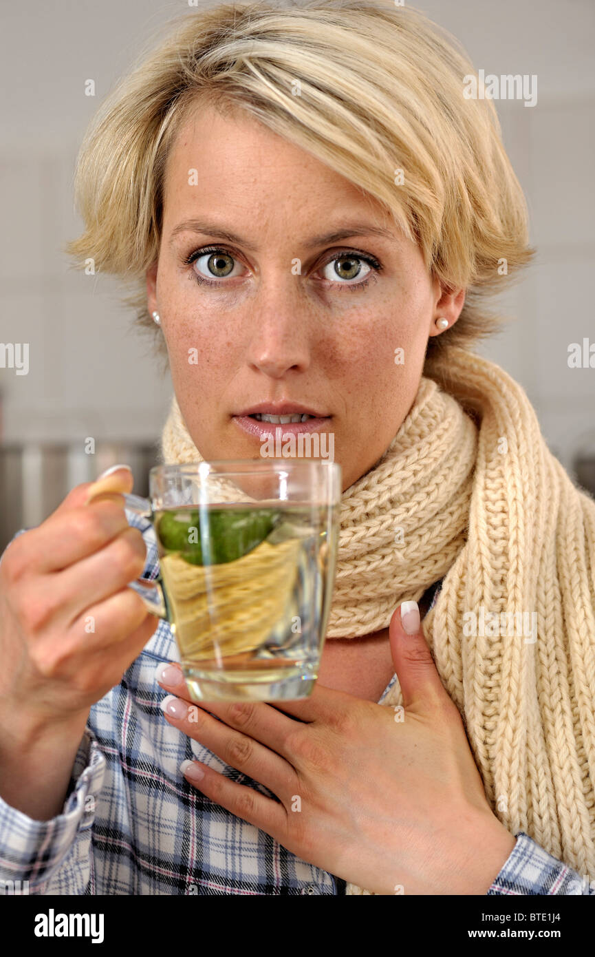Woman drinking sage tea Stock Photo Alamy