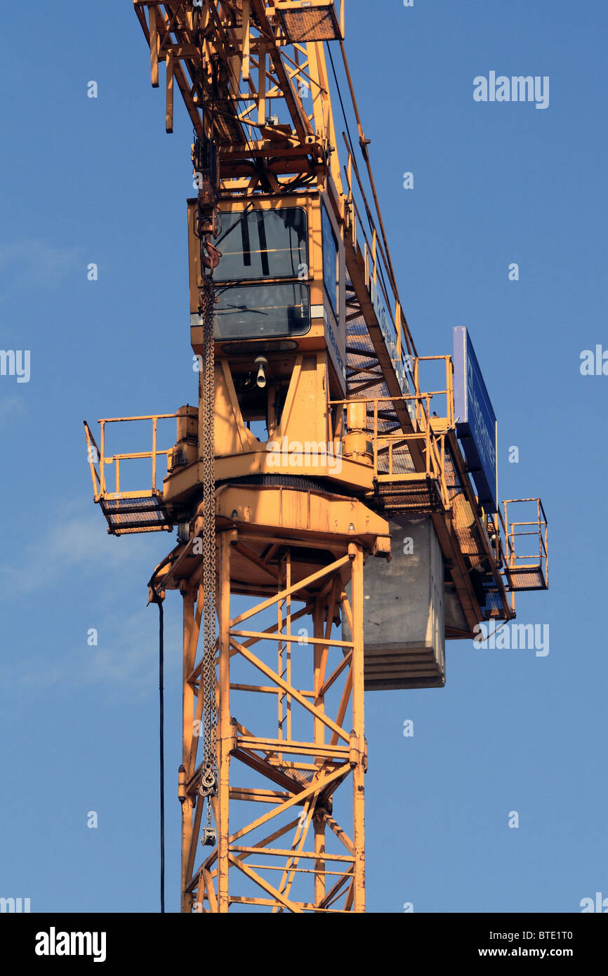 Crane against blue sky Stock Photo - Alamy