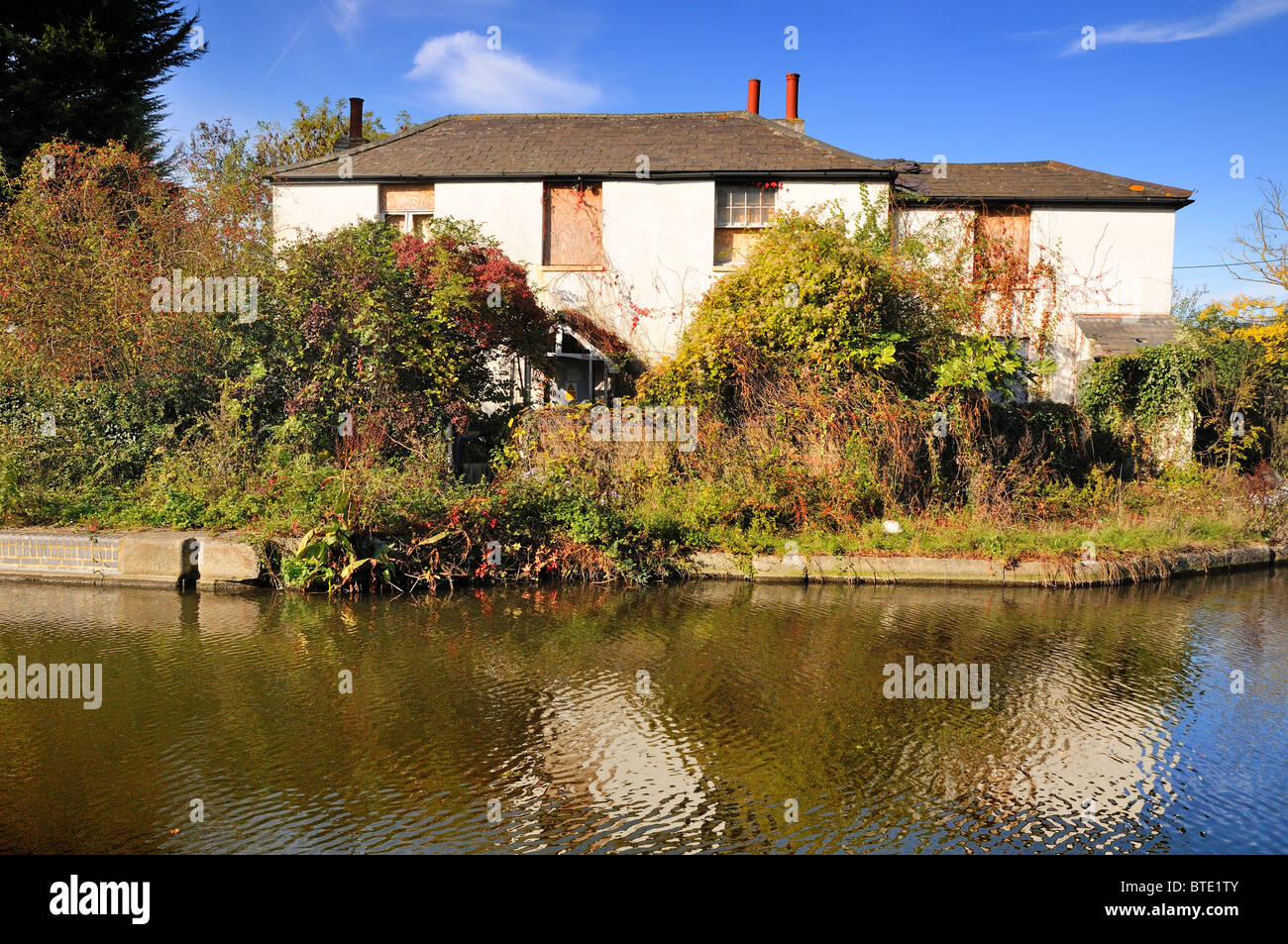 Derelict canal side house at Southall , West London Stock Photo