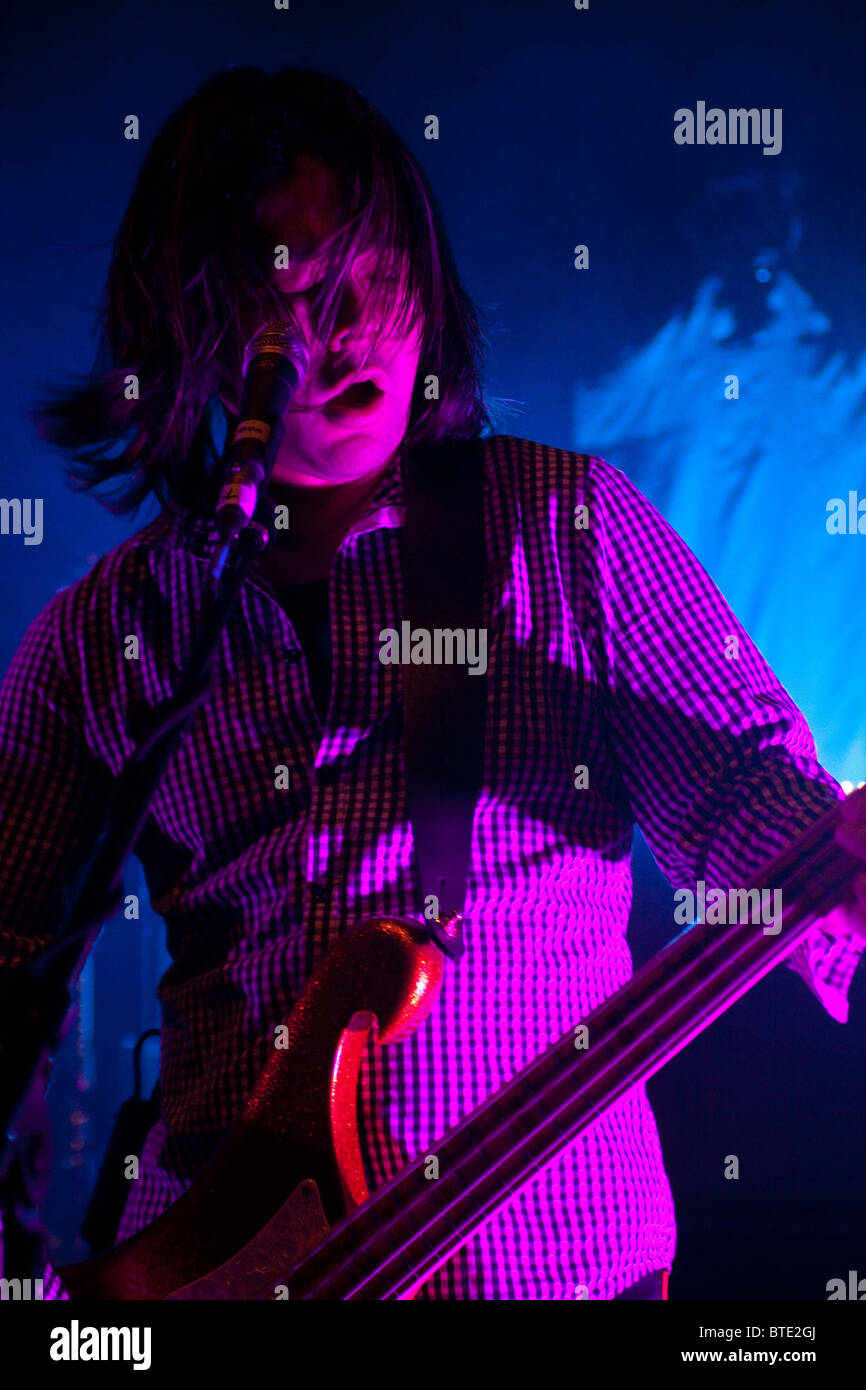Taka Hirose Bassist Of The Band Feeder Performing At The Shepherds Bush Empire London Stock Photo Alamy