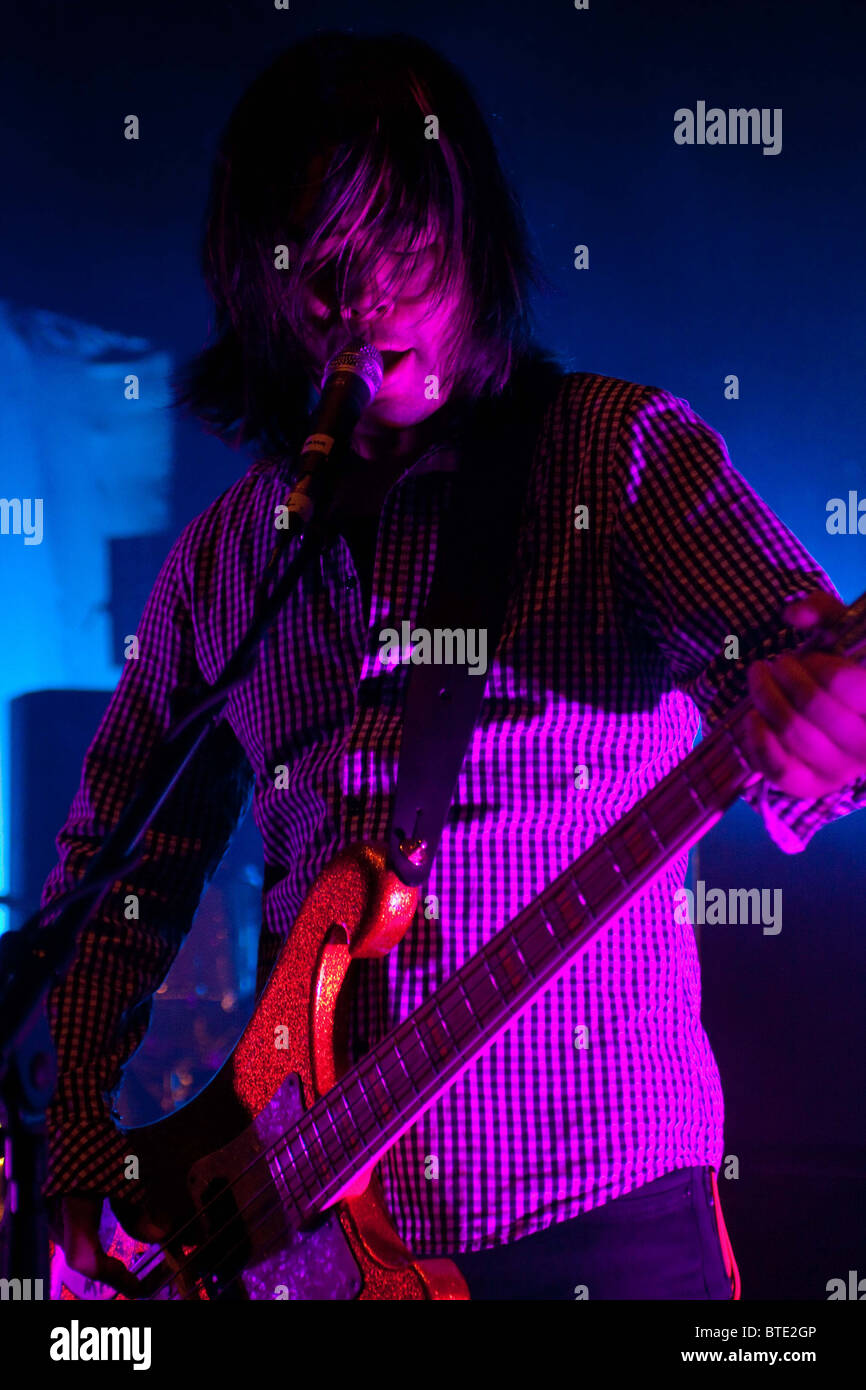 Taka Hirose Bassist Of The Band Feeder Performing At The Shepherds Bush Empire London Stock Photo Alamy