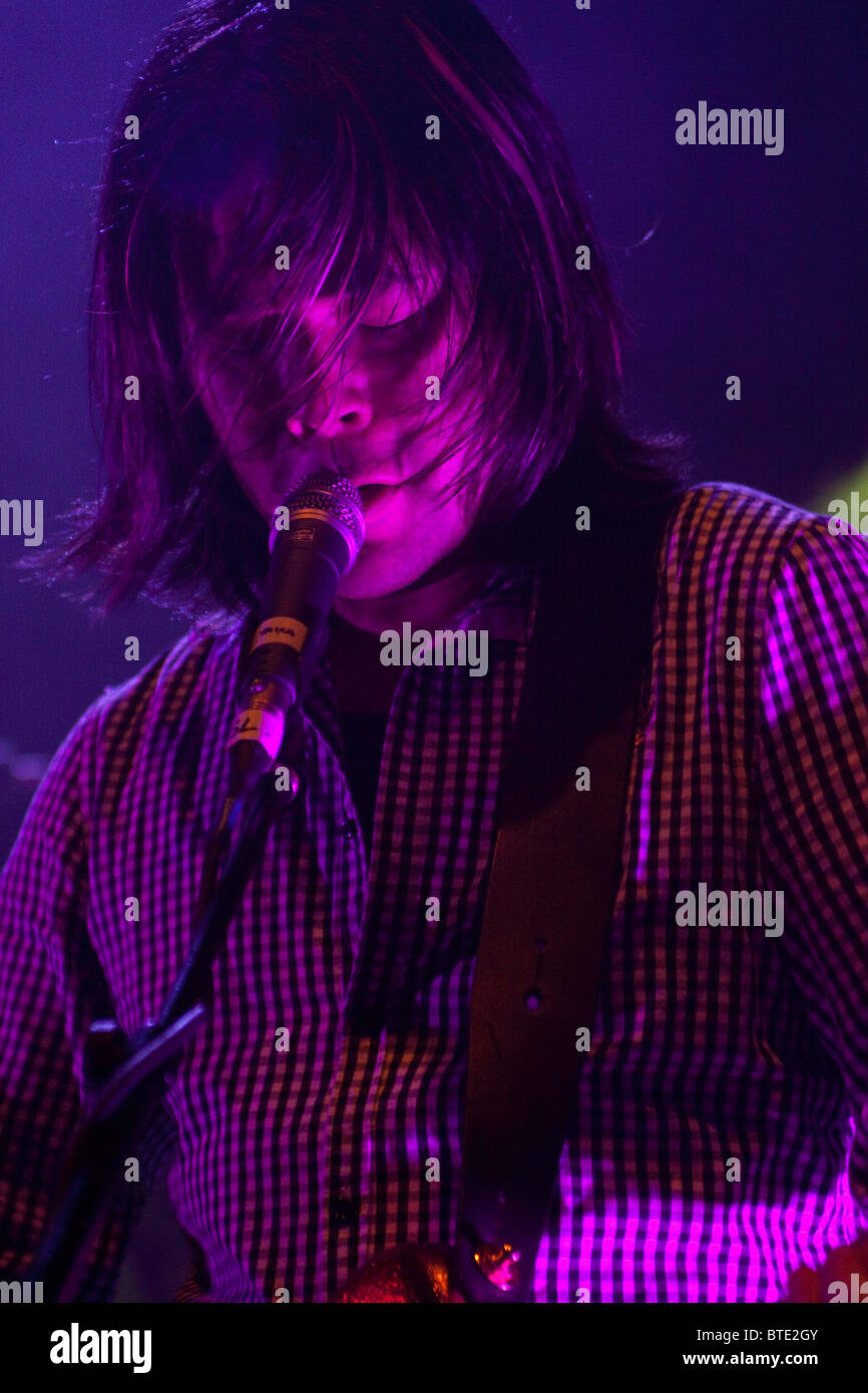 Taka Hirose Bassist Of The Band Feeder Performing At The Shepherds Bush Empire London Stock Photo Alamy