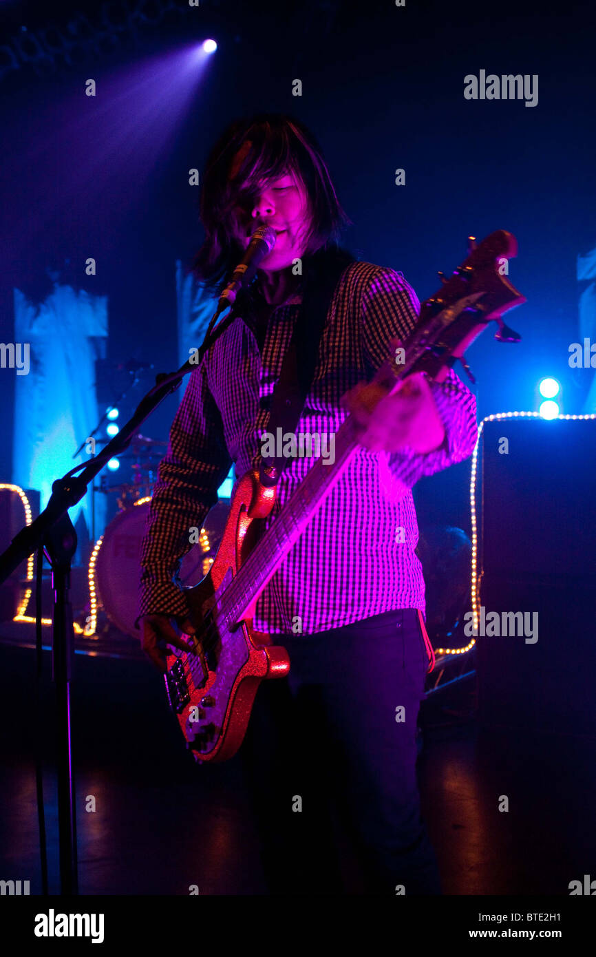 Taka Hirose Bassist Of The Band Feeder Performing At The Shepherds Bush Empire London Stock Photo Alamy