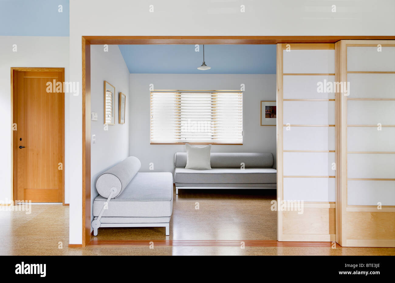 Sliding pocket doors to modern living room Stock Photo