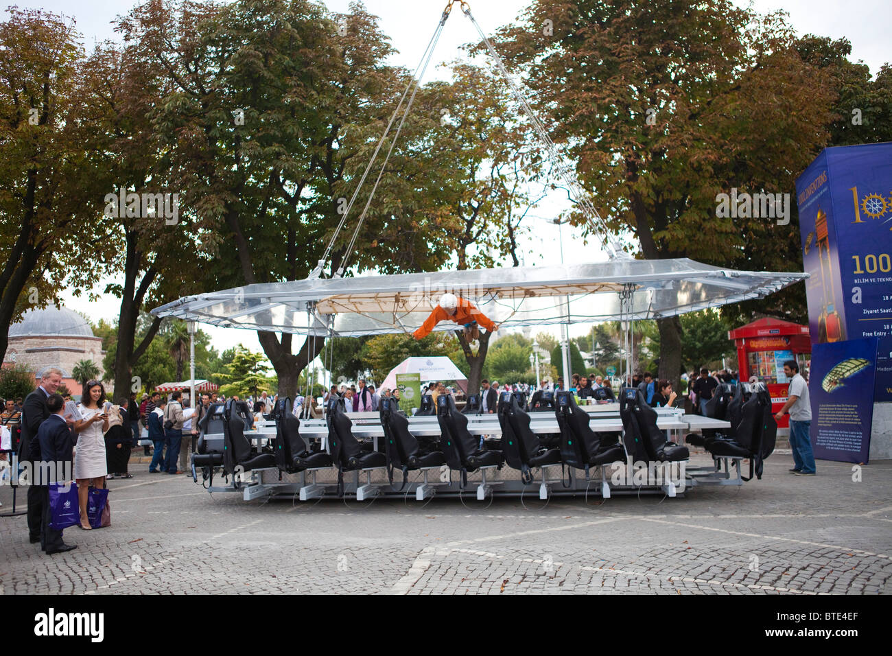 Restaurant Suspended by a crane on ground before lift off. dinner in