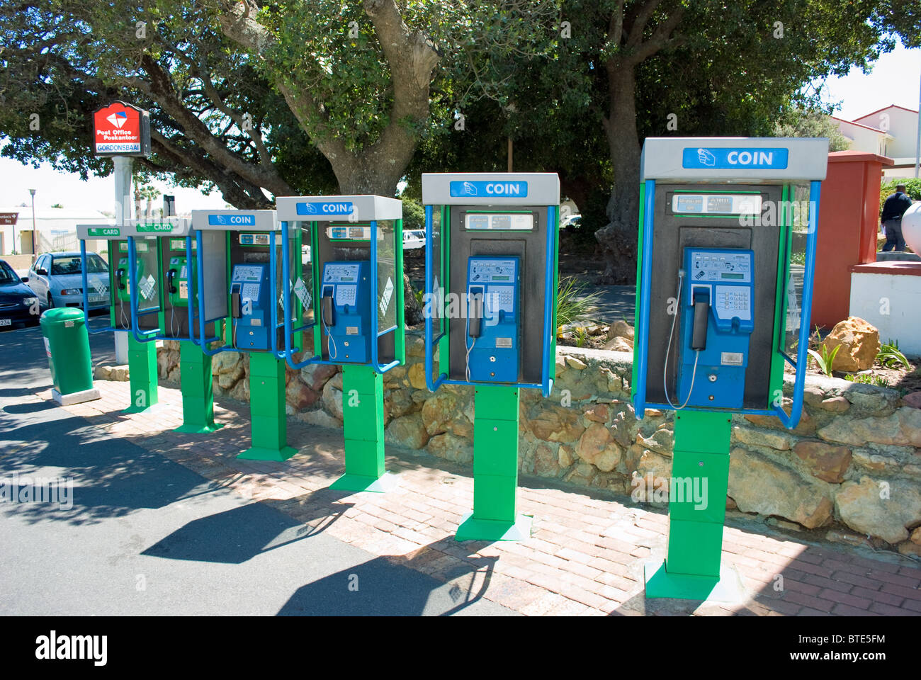 A row of telephone boxes in Gordon's Bay, near Cape Town, South Africa. Stock Photo