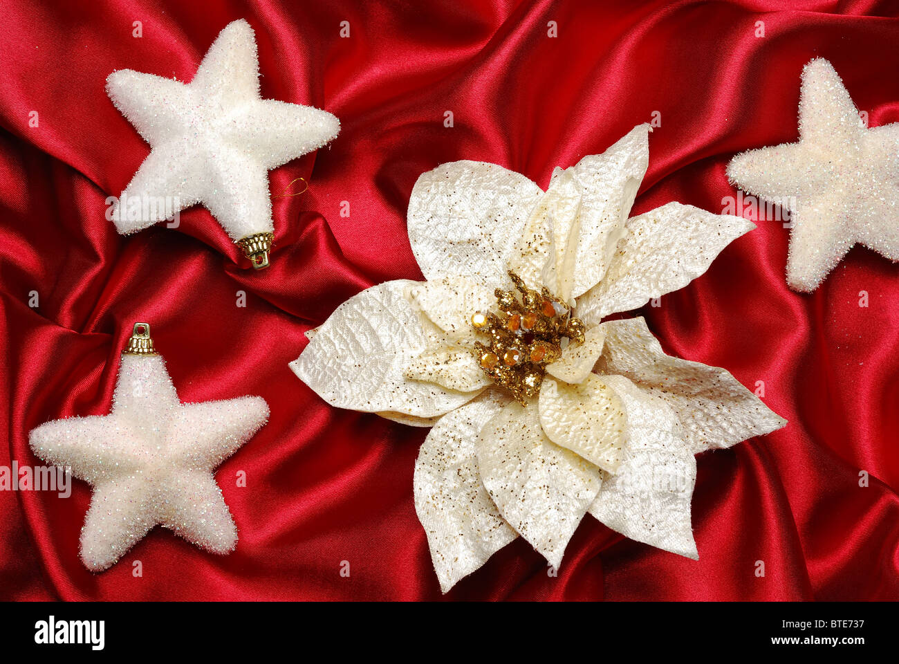 Christmas Material, X'mas Flower 、pinus, Christmas Hat And Stocking On Red  Background Stock Photo, Picture and Royalty Free Image. Image 194316622.