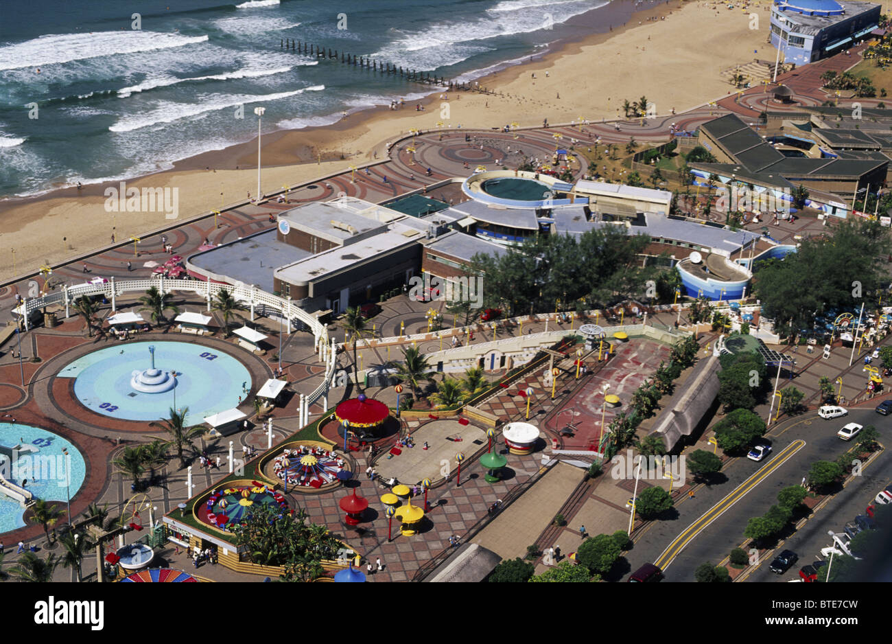 An elevated view of the esplanade area in Durban with pools and the adjacent beach Stock Photo