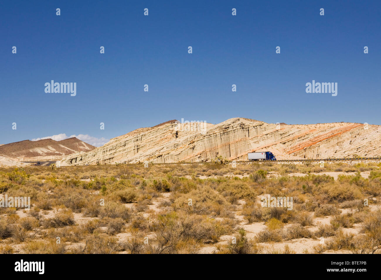 Road cutout showing sedimentary layers - California USA Stock Photo