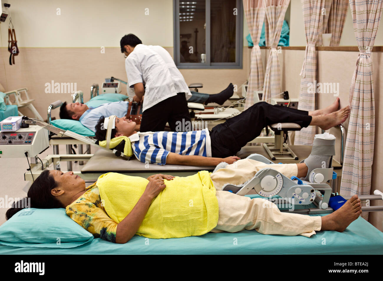 Doctor and patients in hospital rehabilitation center, Taiwan Stock Photo