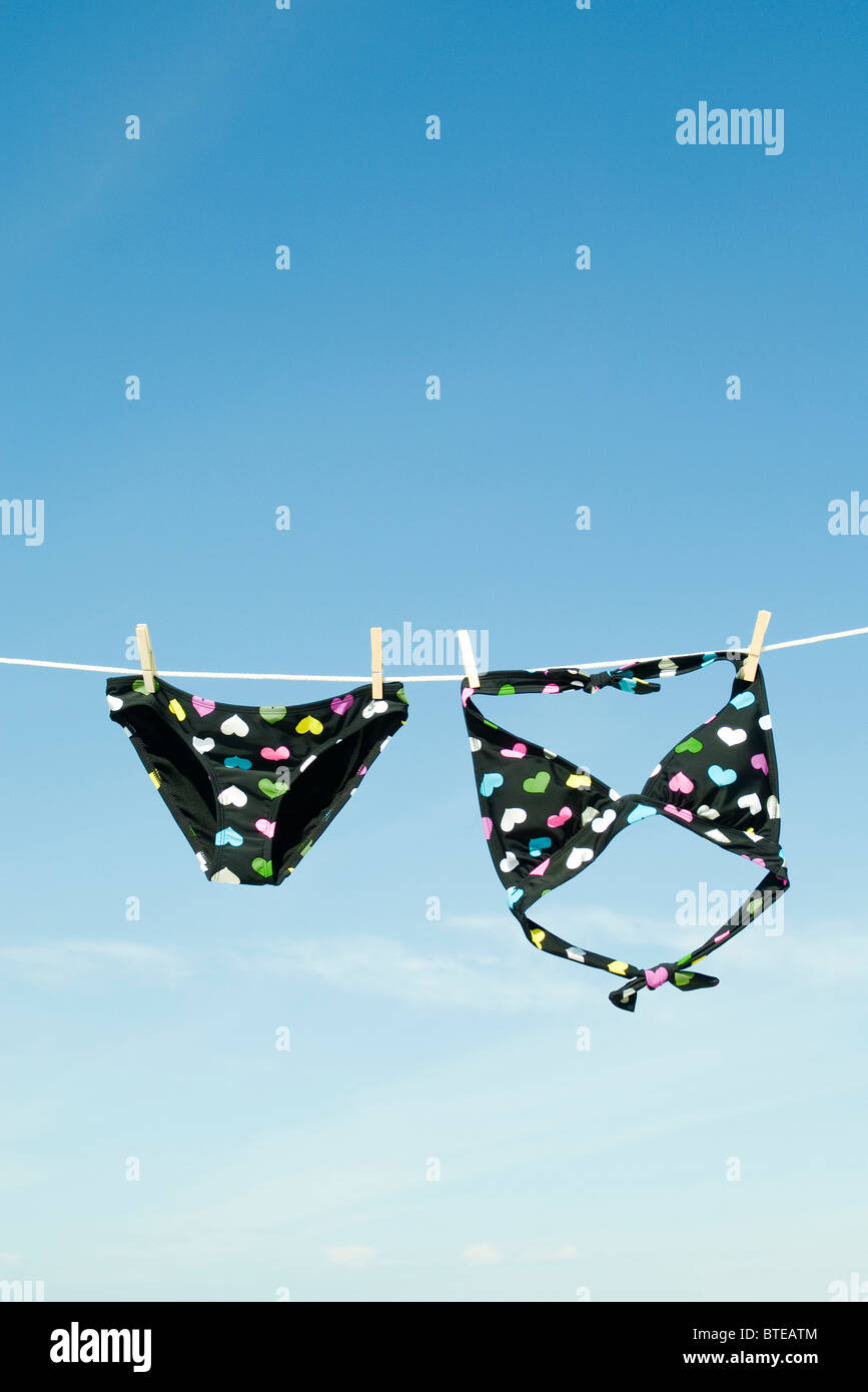 Bikini hanging on clothes-line Stock Photo