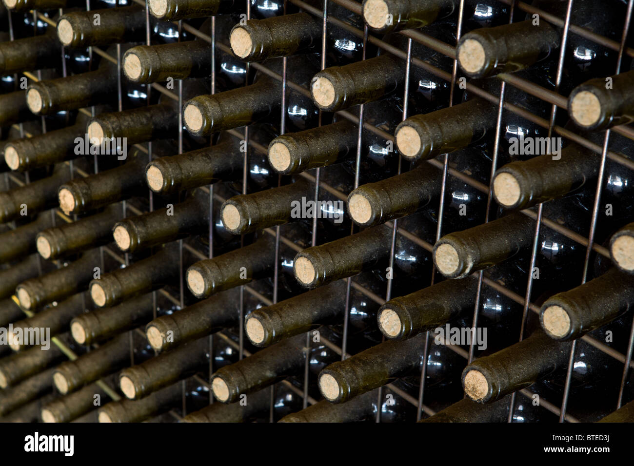 Wine bottles stored in a wine cellar in Spain Stock Photo