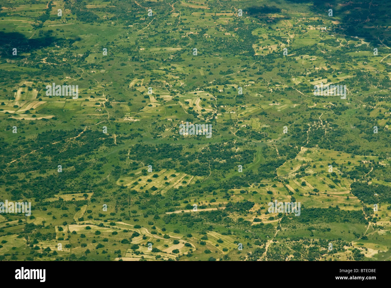 Aerial scenic view of cultivated and uncultivated land Stock Photo Alamy