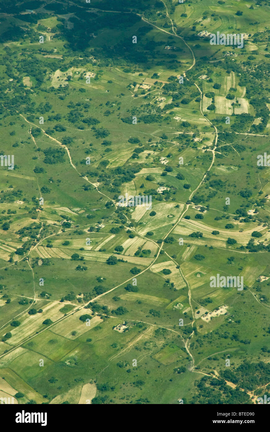 Aerial scenic view of cultivated and uncultivated land Stock Photo Alamy