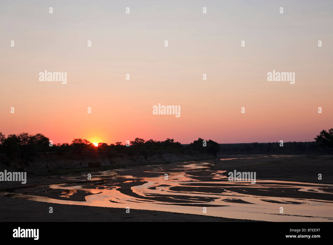 The Mwenezi riverbed at sunset Stock Photo