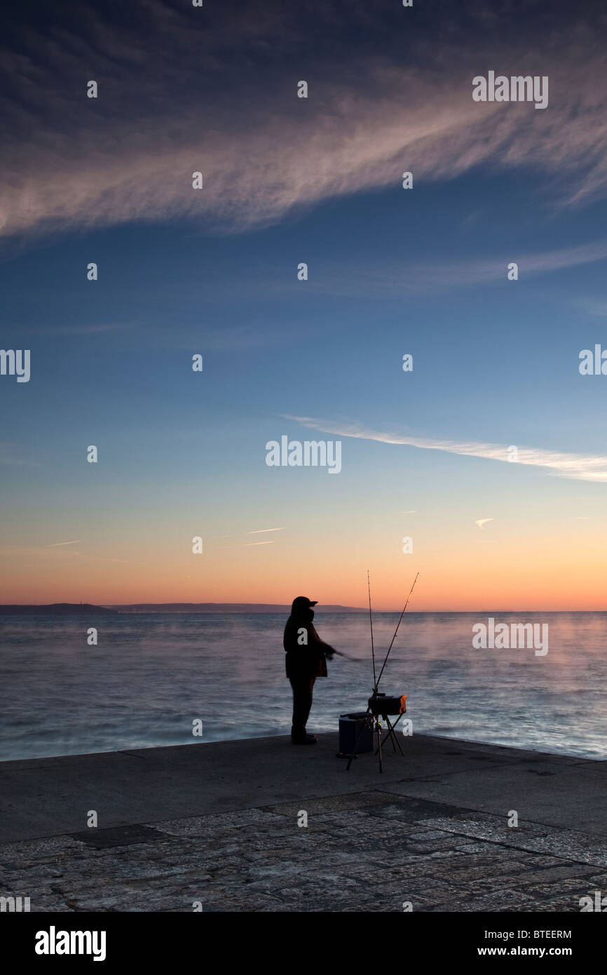 Fishing before Sunrise Stock Photo - Alamy