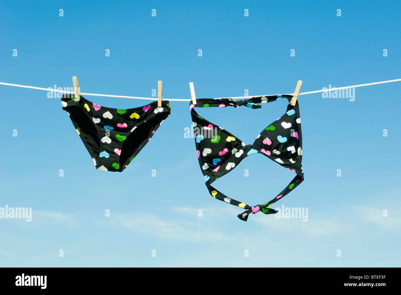 Bikini hanging on clothes-line Stock Photo