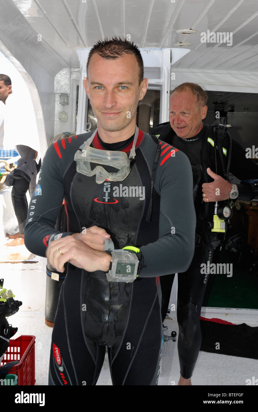 Scuba diver on a diving boat in the Red Sea Stock Photo