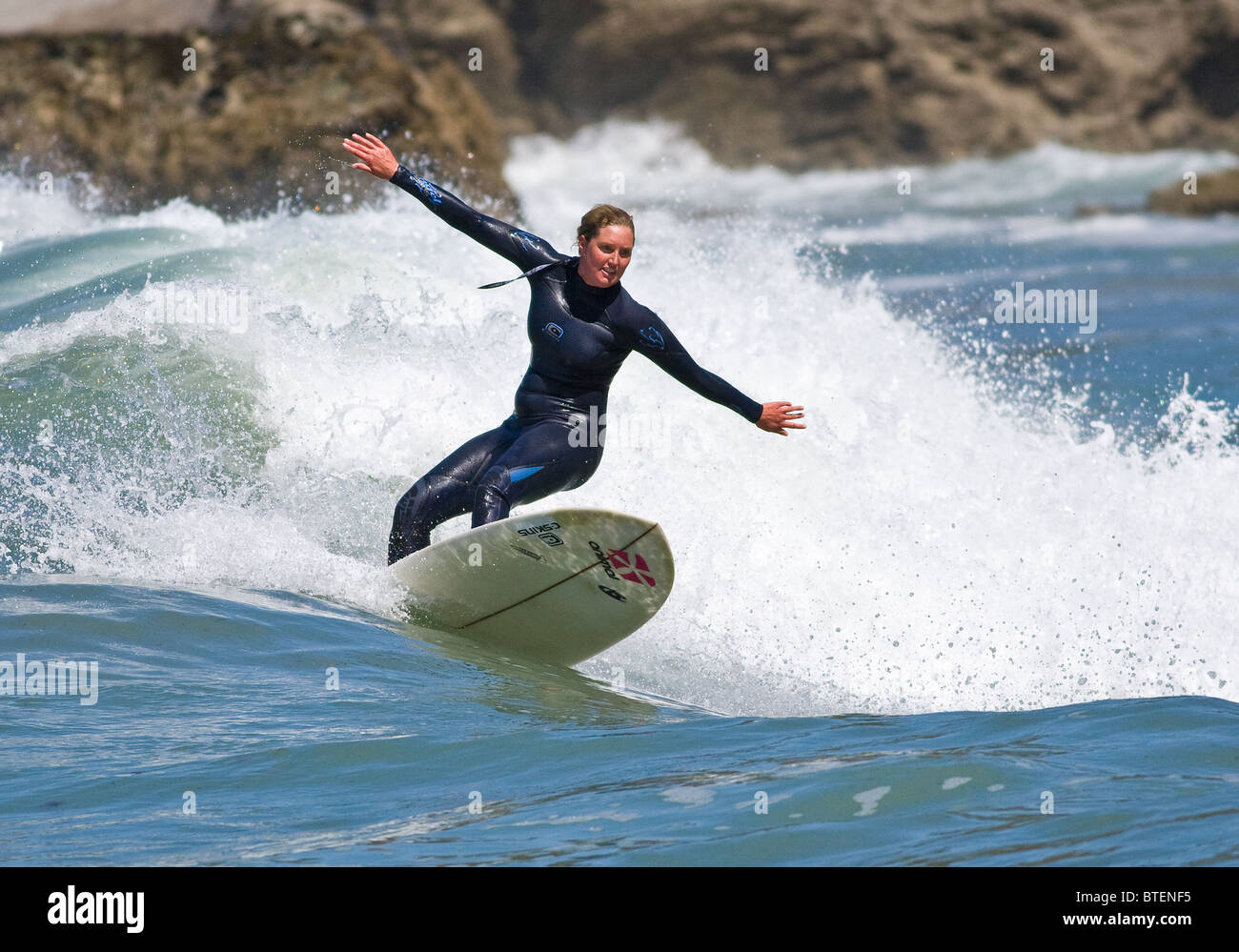 Surfing at St Agnes, Cornwall, UK Stock Photo