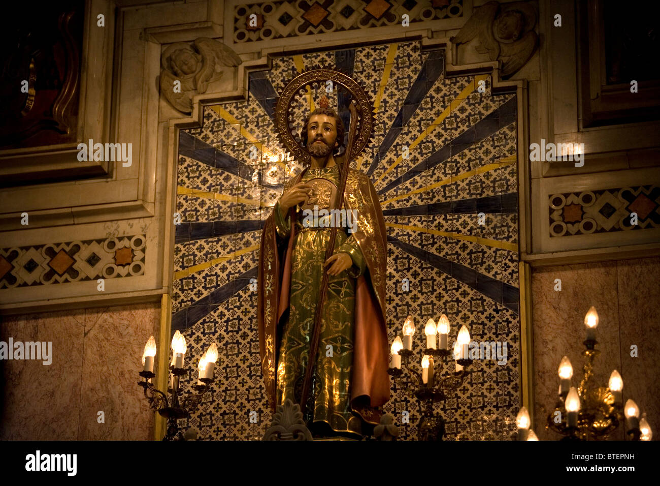 A sculpture of Saint Jude Thaddeus is displayed in the main altar of San Hipolito's church in Mexico City Stock Photo